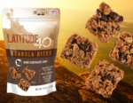 Latitude 40 Snacks Dark Chocolate granola bites bag with 4 bites and a mountain background